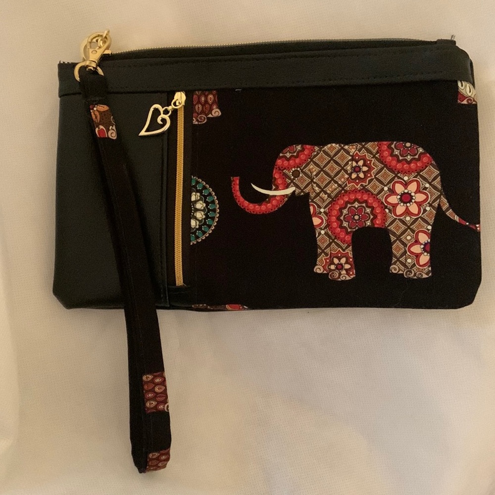 artisan wristlet purse with quilted elephant detail and mini zip pocket new